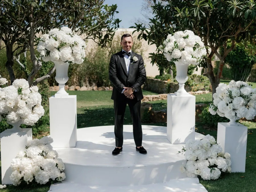 groom at the altar on their wedding solar paço algarve